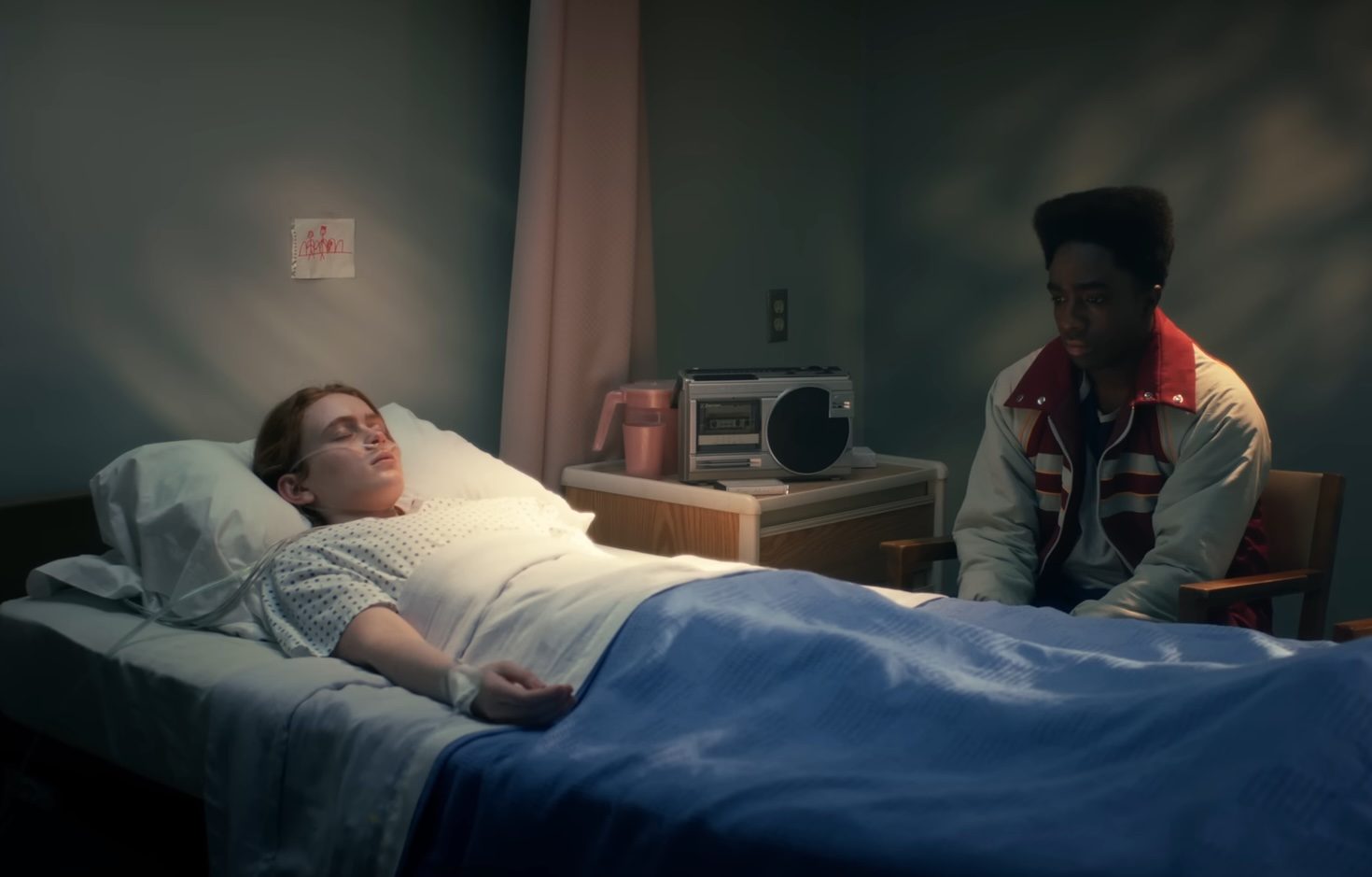 Max lying in a hospital bed next to Lucas in Stranger Things season 5.