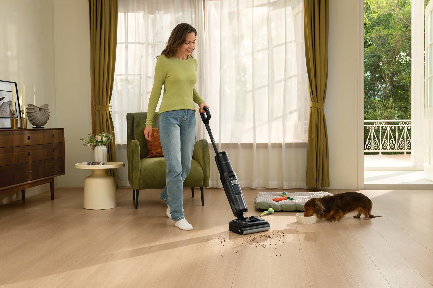 A woman using the Tineco Floor One S7 Stretch Ultra cordless vacuum cleaner.