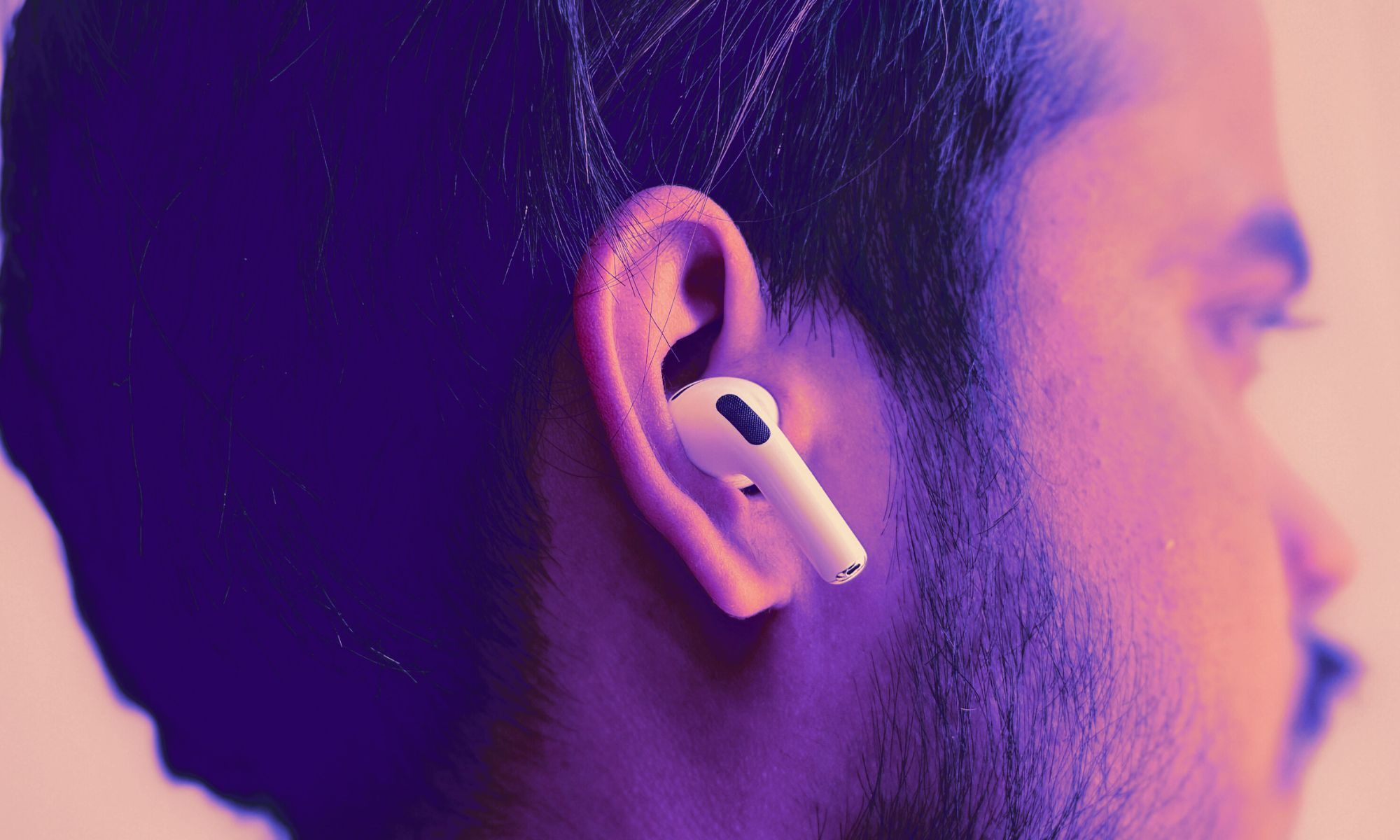 Close-up of a person wearing AirPods Pro 3
