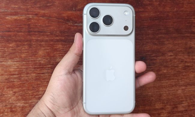 Hand holding iPhone 17 Pro.