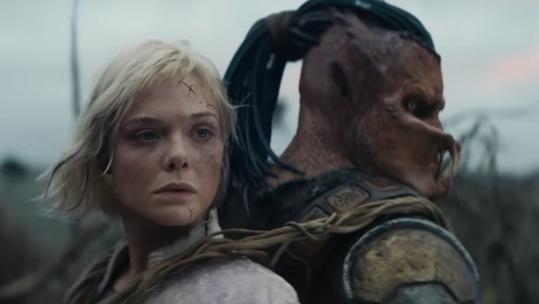 Thia and Dek back-to-back in Predator Badlands.