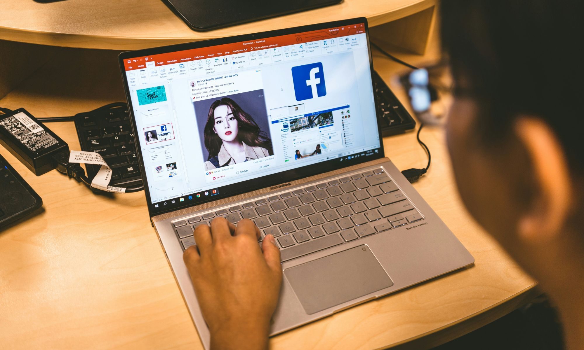 Facebook homepage on laptop