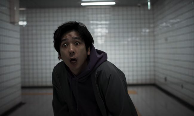 Kazunari Ninomiya looking horrified in the horror film, Exit 8.