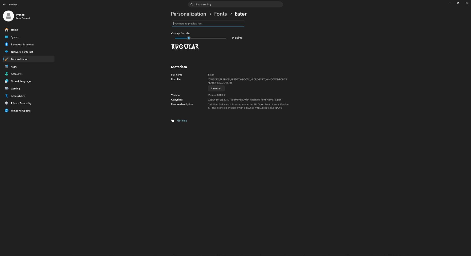 Screenshot of Windows 11 settings showing a font with uninstall option.