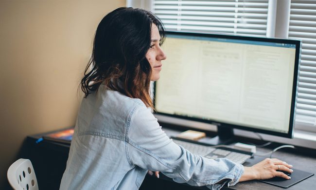 Woman using a PC desktop