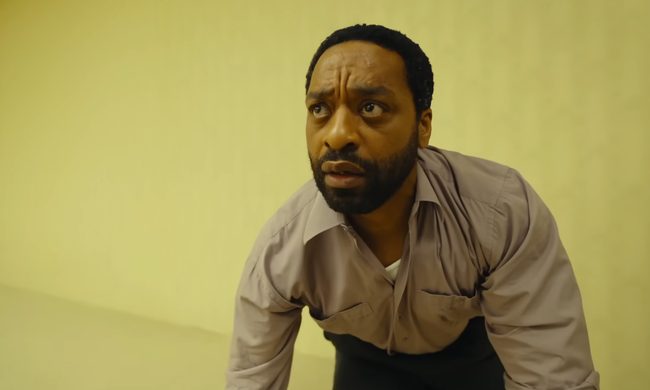 Chiwetel Ejiofor looking astonished in Backrooms, the horror film directed by Kane Parsons and produced by A24.