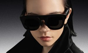 Person wearing Xreal Project Aura smart glasses.