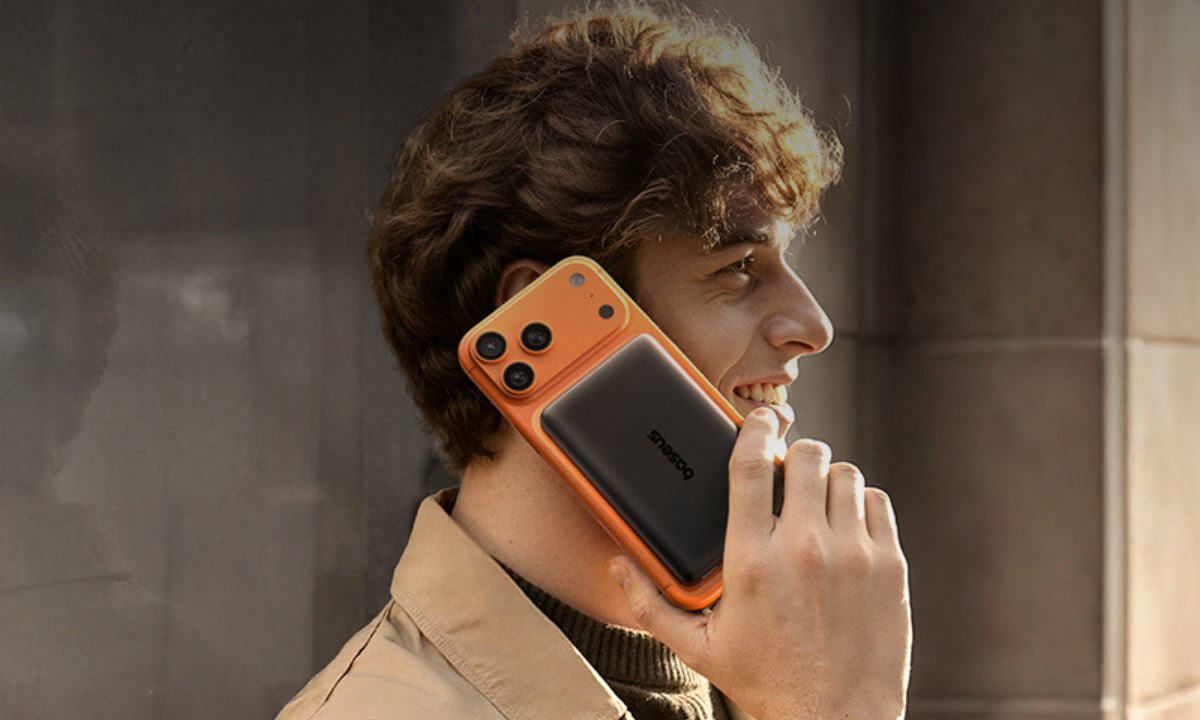 iPhone with a power bank magnetically attached to it