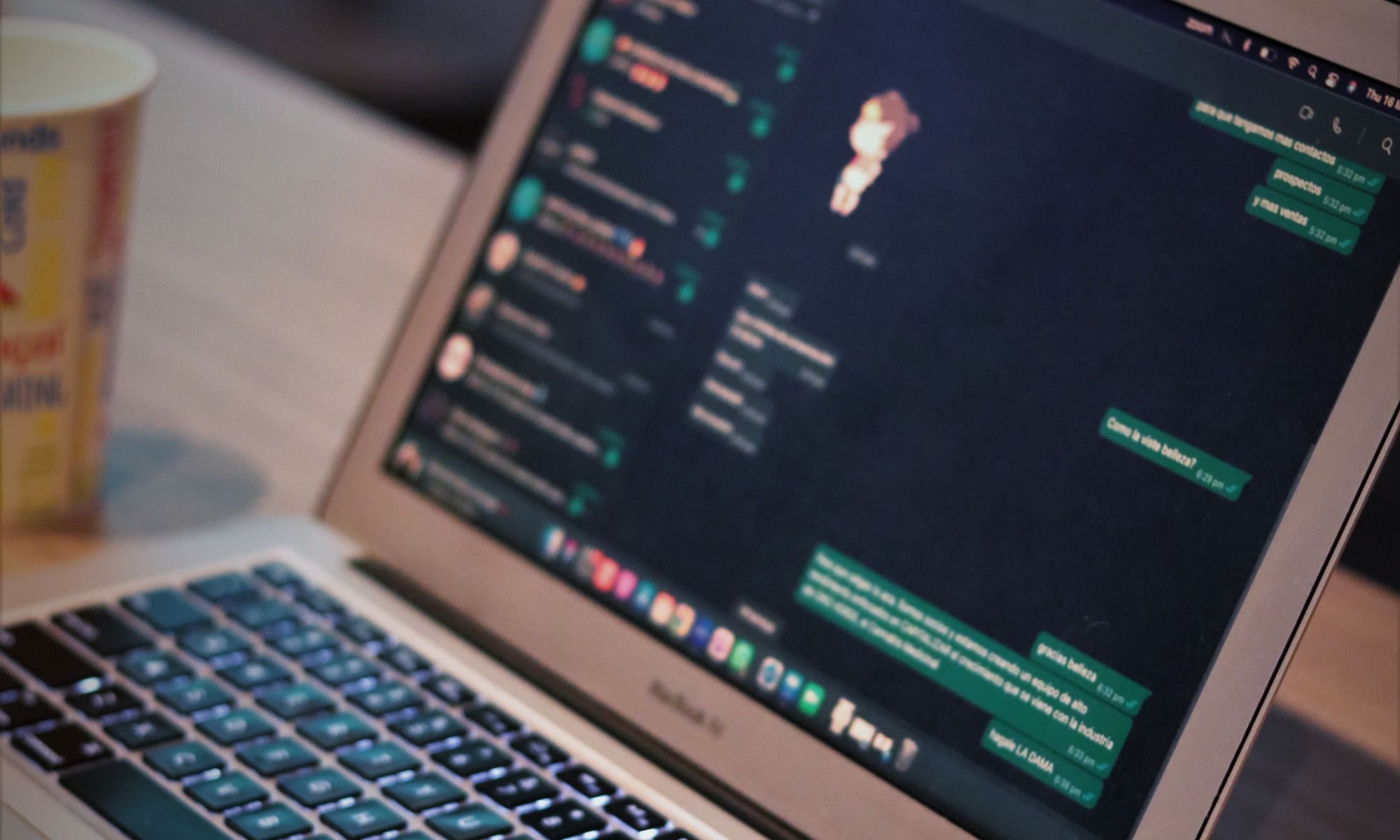WhatsApp open on a MacBook Air