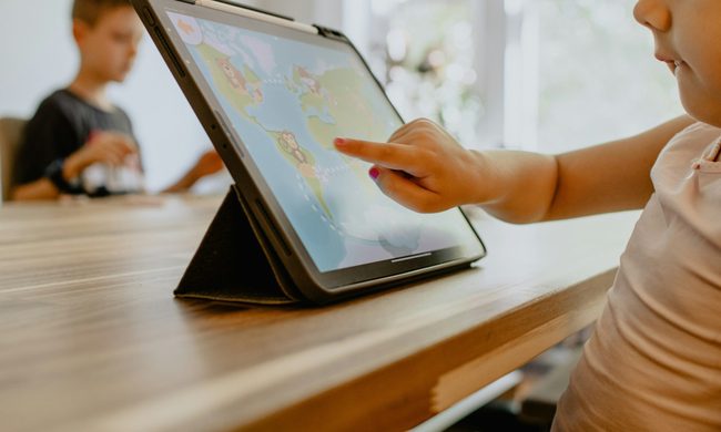Kid using an iPad