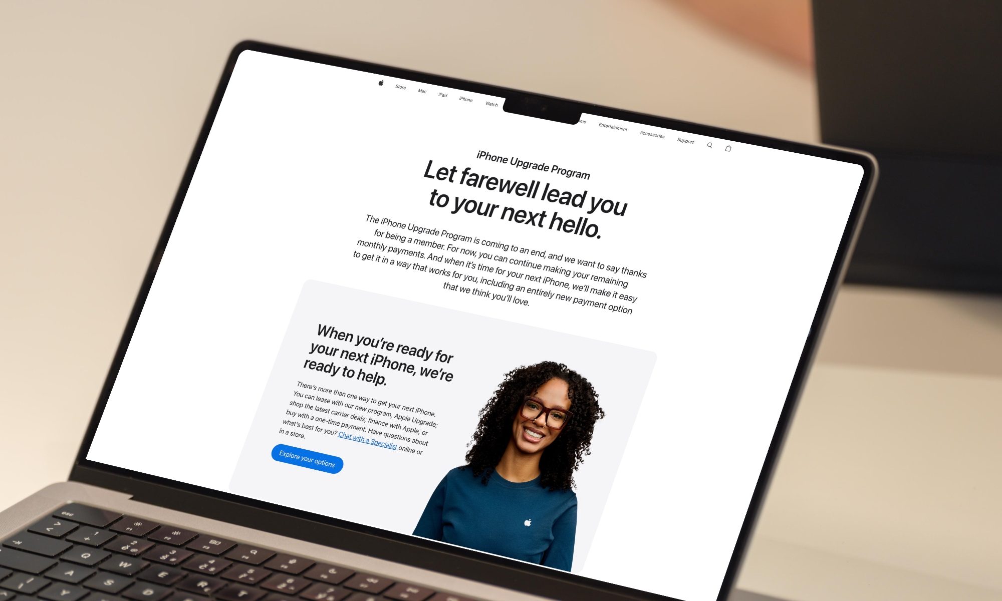 Apple upgrade program website open MacBook
