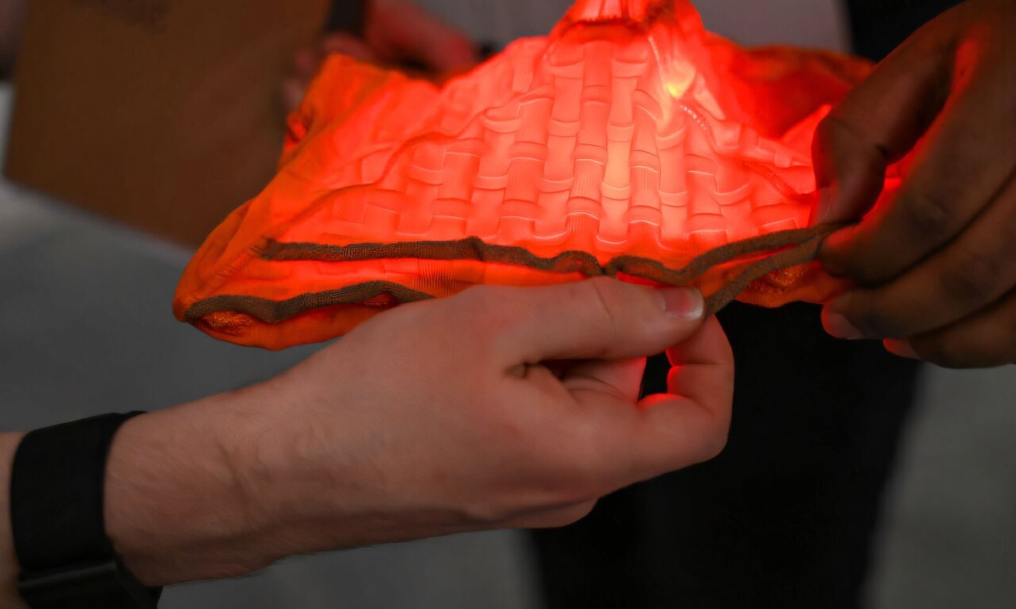 A reconfigurable lamp shade with multistable switches that correspond to different colors of light.
