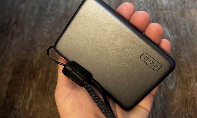 holding charger in hand