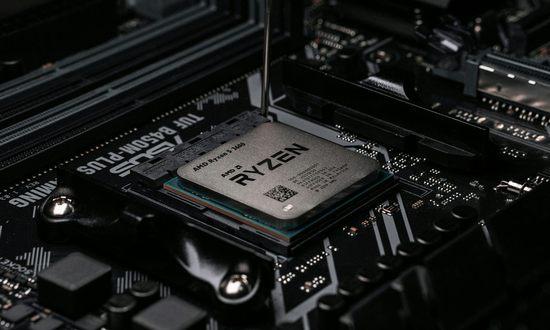 AMD Ryzen CPU inside a socket installed on a motherboard