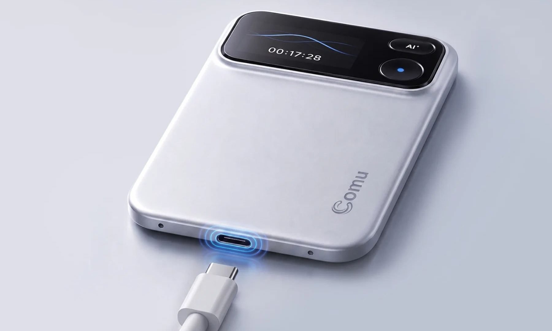 Comu Action Pro AI voice recorder in hand