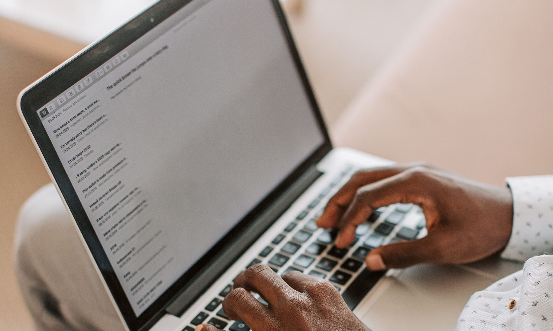 Writing emails on a laptop