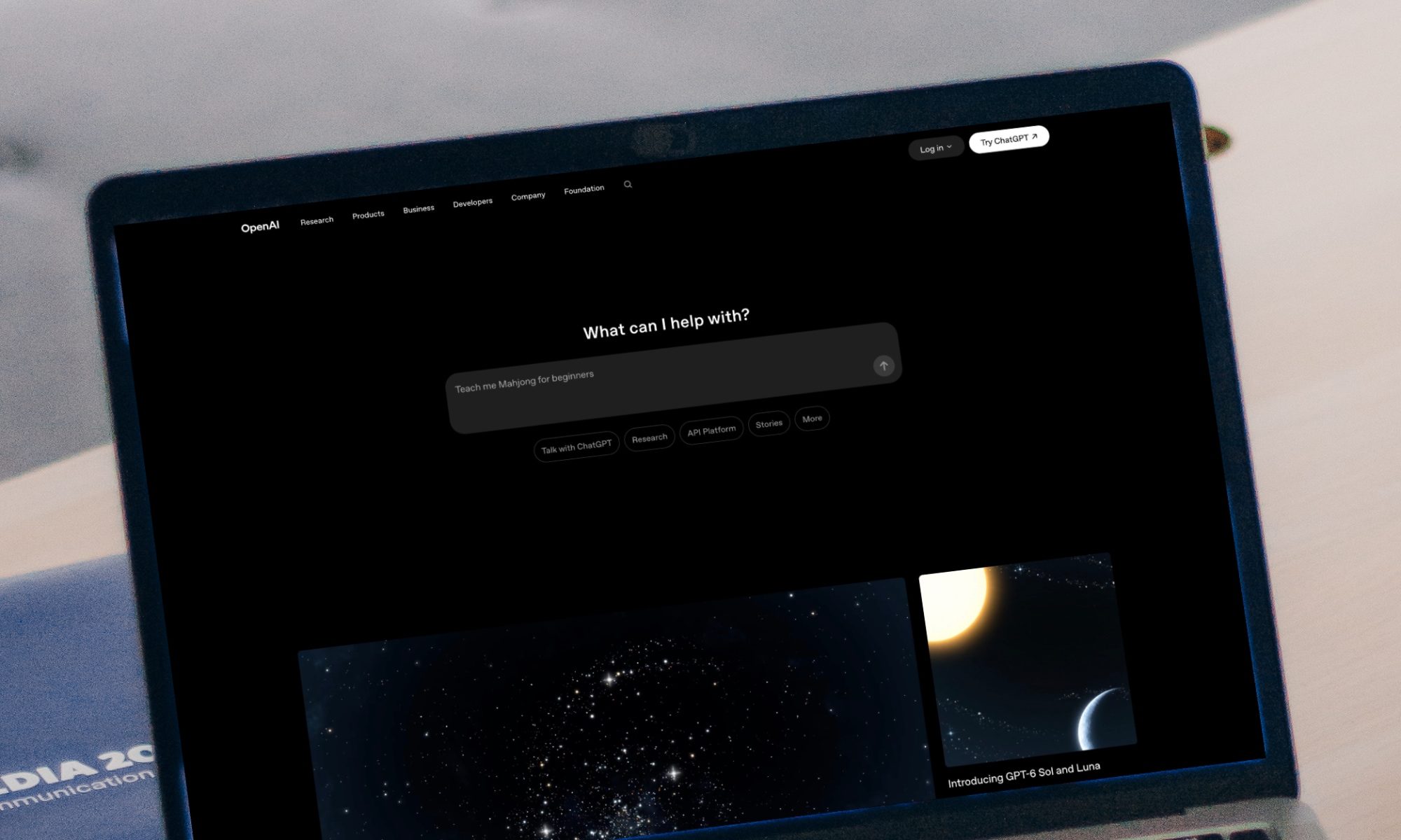 OpenAI website open on MacBook