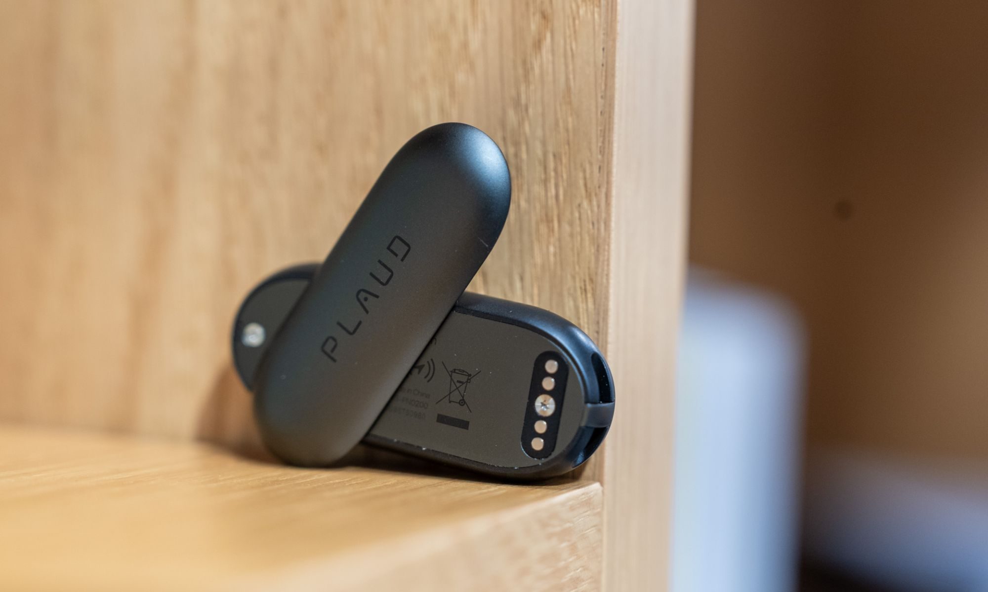 Plaud NotePin placed on a shelf
