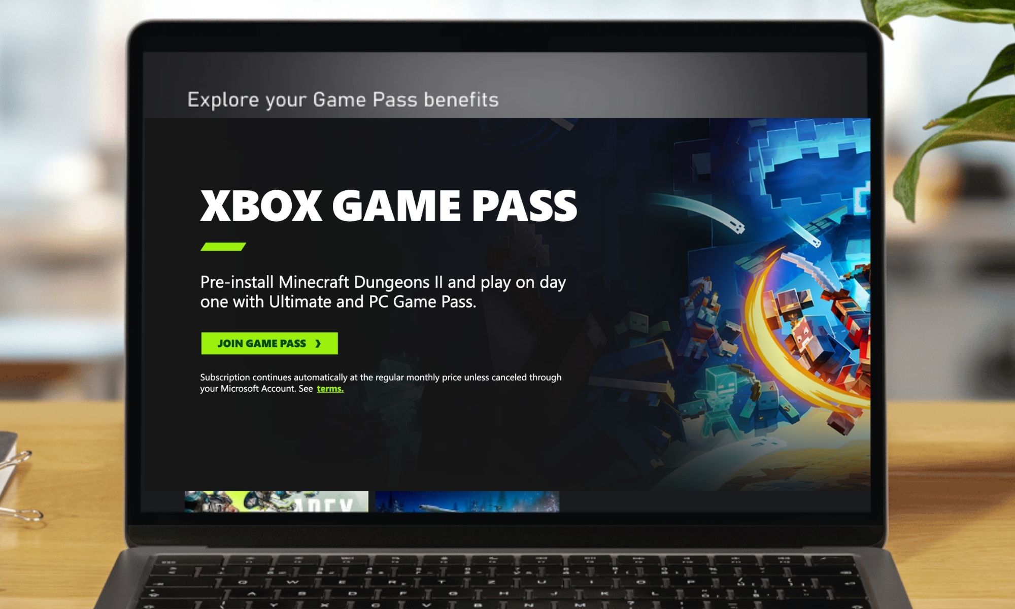 Xbox Game Pass depicted on a laptop.