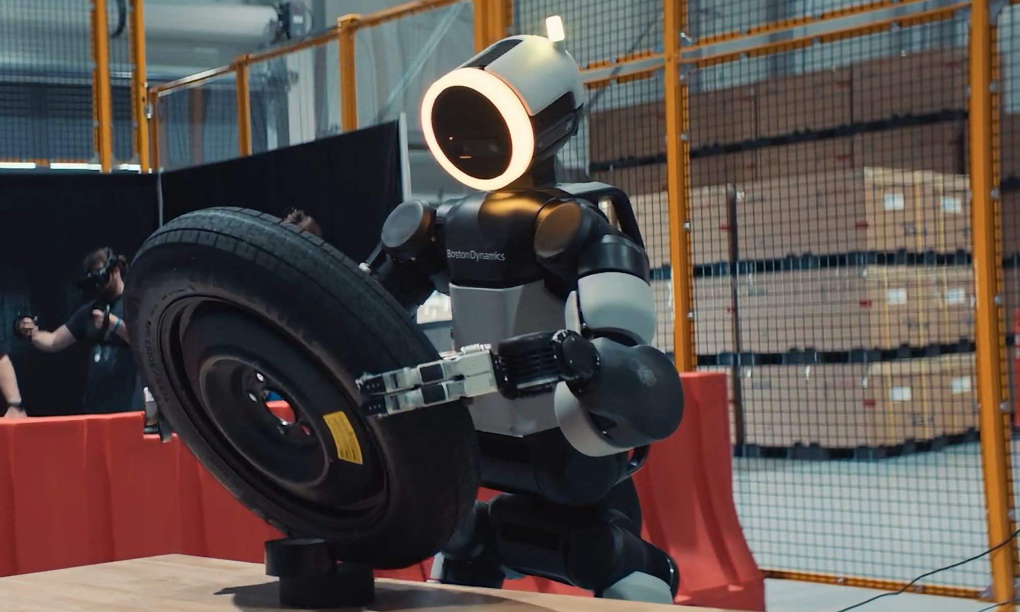 Atlas lifting a tire
