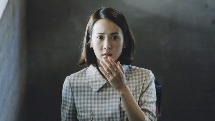 Mrs. Park covering her mouth with her hand in "Parasite."