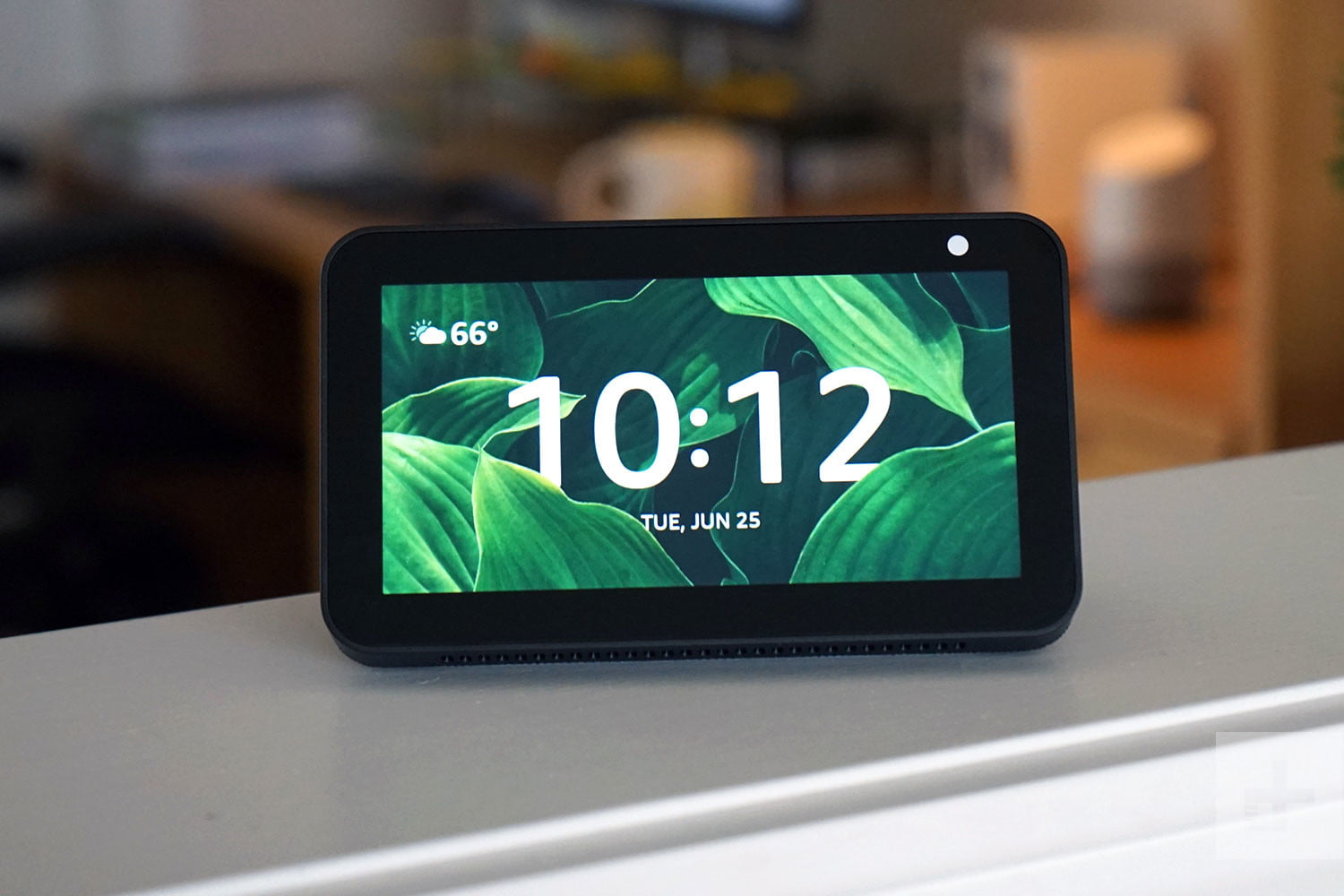 The Amazon Echo Show 5 displaying the time.