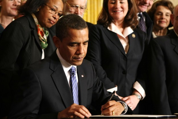 president-obama-signing-something
