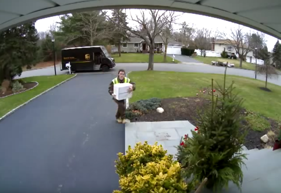 video ups worker throws package onto porch but not before flipping the bird delivery