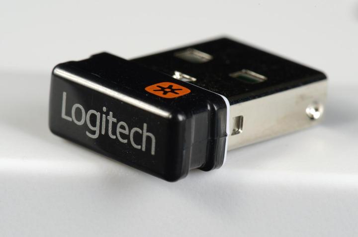 A USB dongle for a Logitech wireless keyboard.