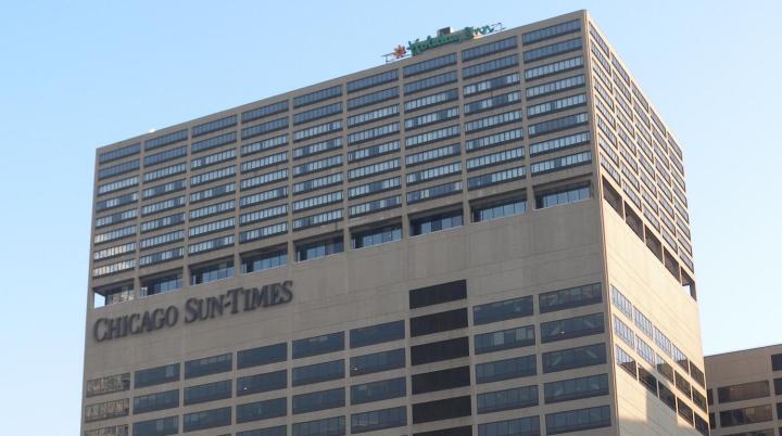 chicago sun times owner agrees rehire four staff photographers replaced iphones building