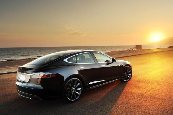 will the success of teslas model s speed along a 35k with 200 mile range tesla sunset beach