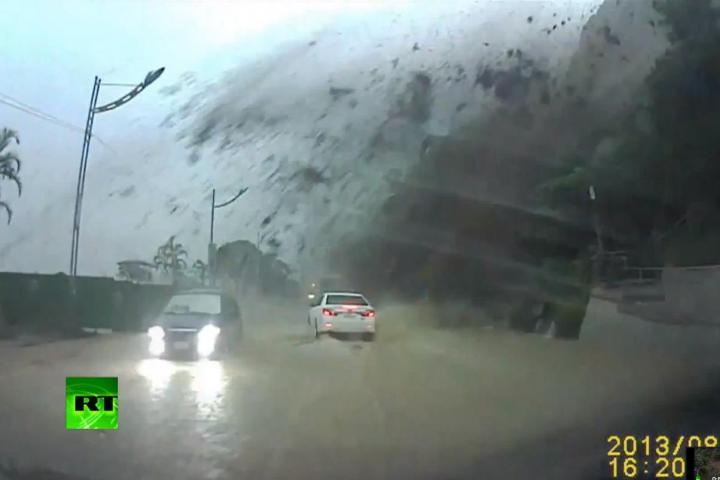 dash cam captures drivers lucky escape boulder