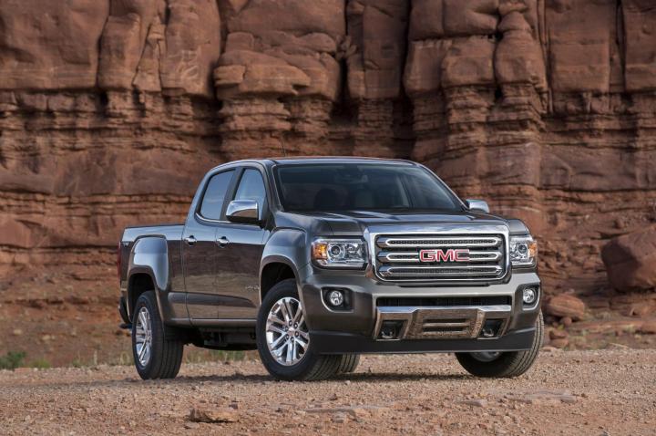 next gmc truck isnt just going rebadged chevy instead will uniquely 2015 canyon slt crew cab front three quarter 005