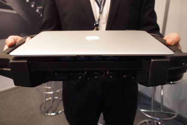This is how big the AlmexPad is compared to a MacBook.