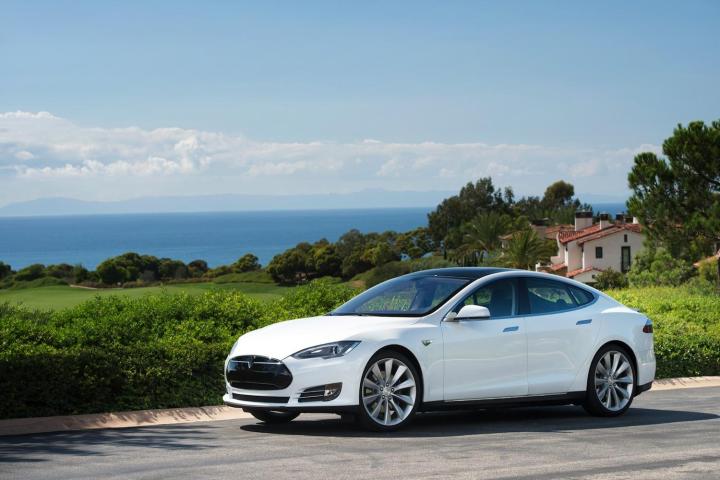 bmw and tesla executives discuss ways to promote electric cars model s white