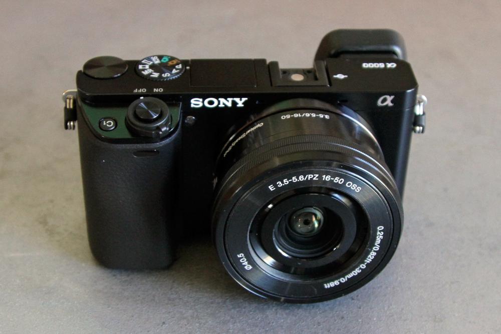 sony unveils alpha a6000 mirrorless camera 6000 front