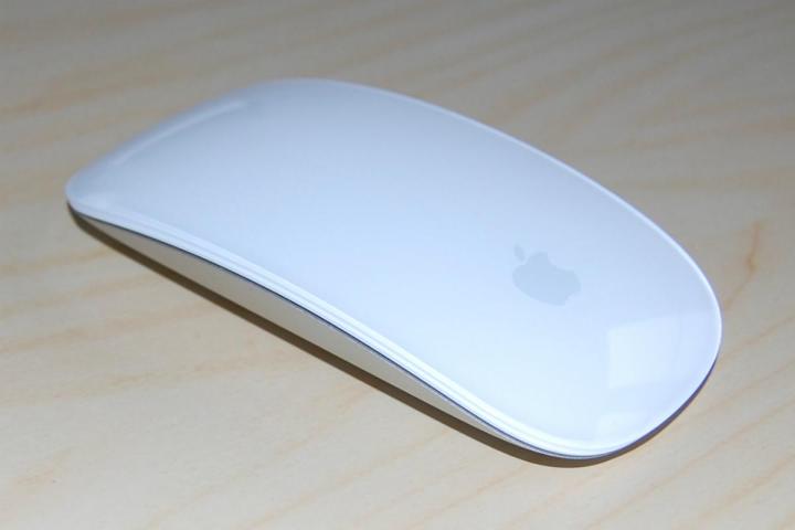 The Apple Magic Mouse on a table.