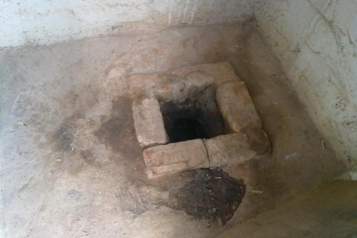 mother son die cell phone open pit toilet
