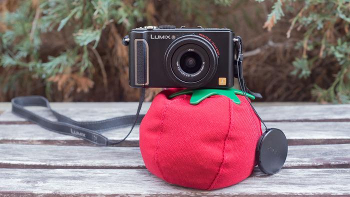 heirloom big red plushy tomato helps stabilize camera
