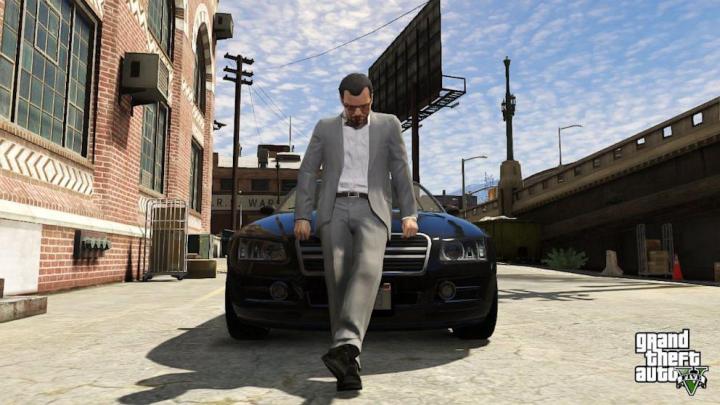 A GTA player in front of a car.