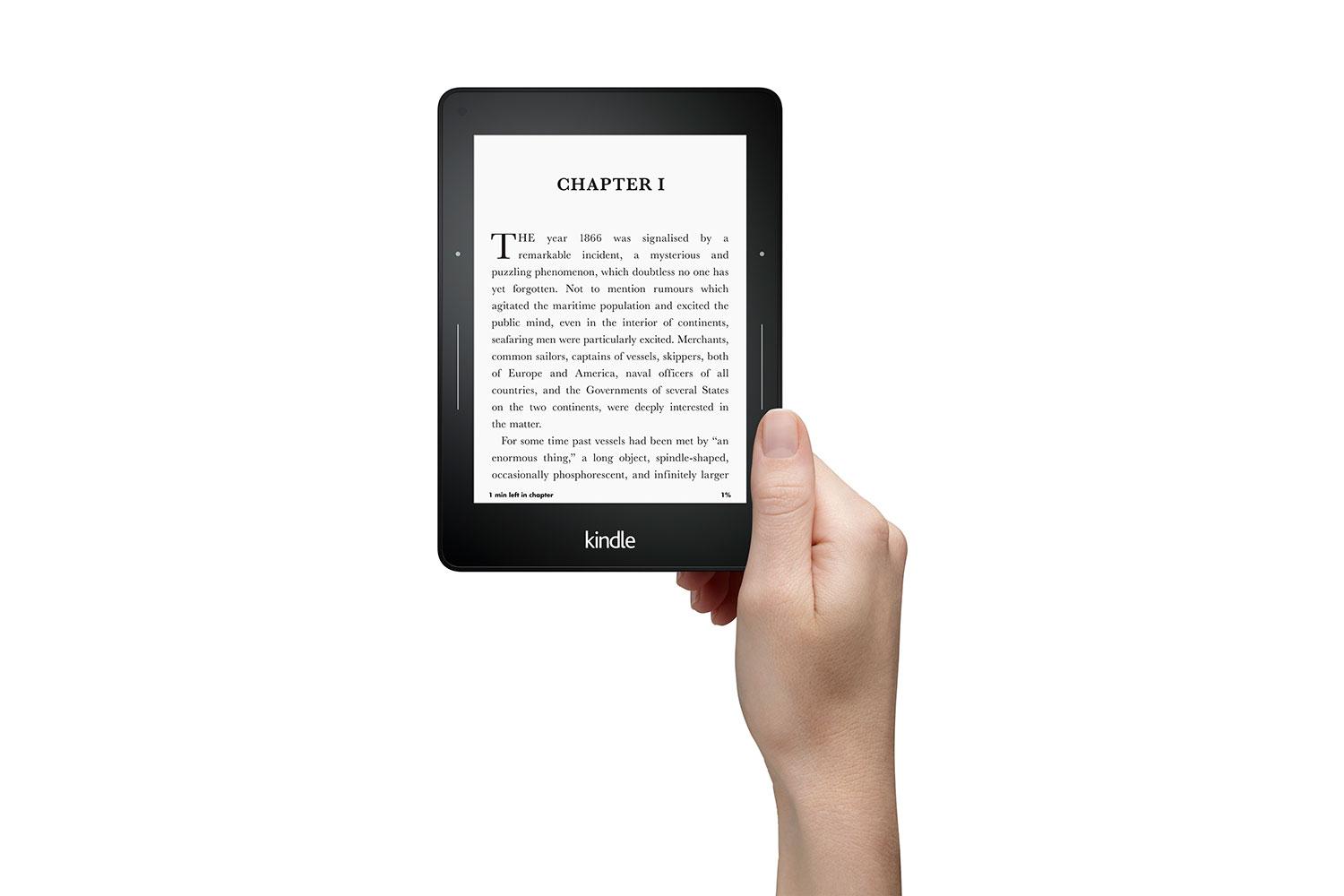 amazon launches high end voyage e reader kindle hand press image