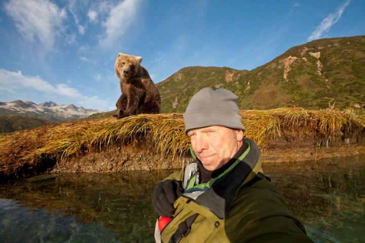 Paul Souders snaps a selfie with a female grizzly