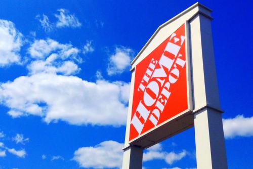 The Home Depot sign with sky as a backdrop.