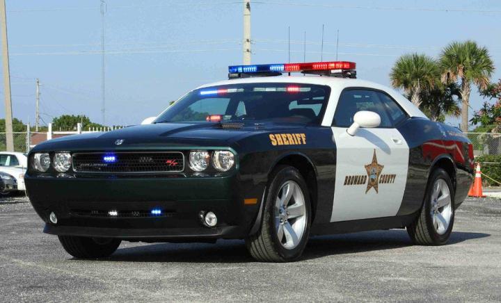 incredulous cop cites man using smartwatch driving dodge challenger rt police car by thecarloos