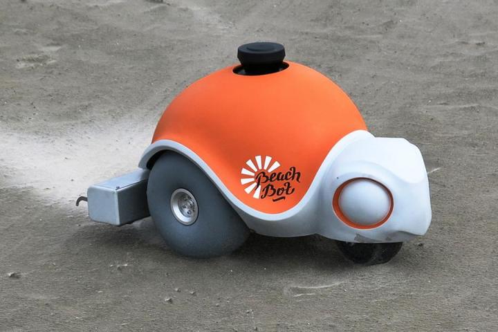 watch disneys new turtle shaped robot draw intricate sand pictures beach beachbot