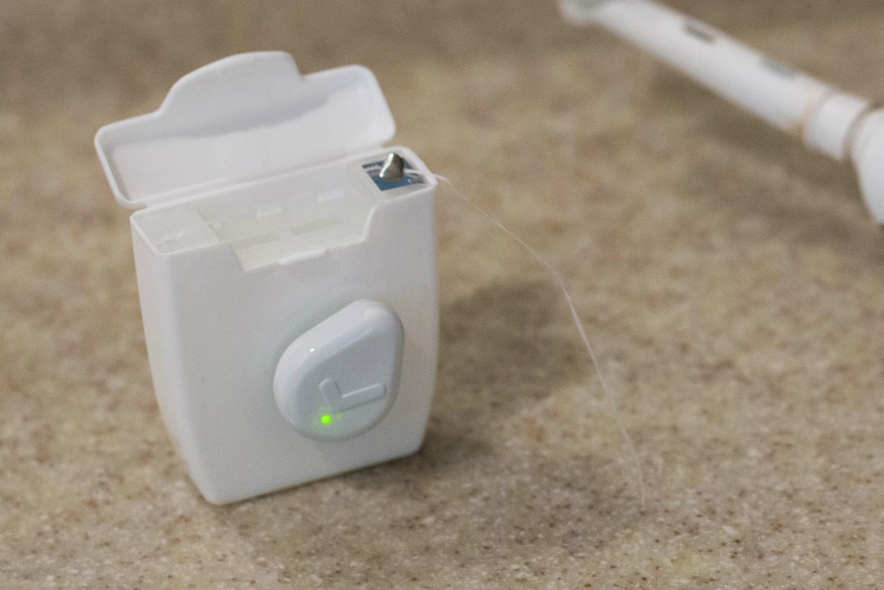 droplet is a reminder button for everyday chores floss