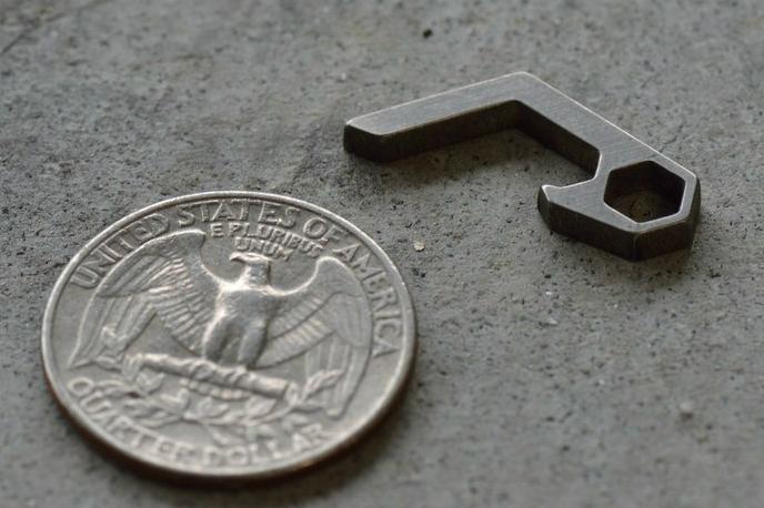 pico the micro bottle opener is size of a quarter
