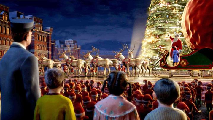 People gaze at a Christmas tree in The Polar Express.