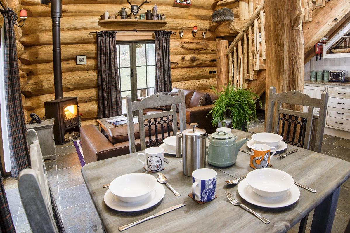 retreat from society and relax in these idyllic cabins around the world eagle brae highland log 7