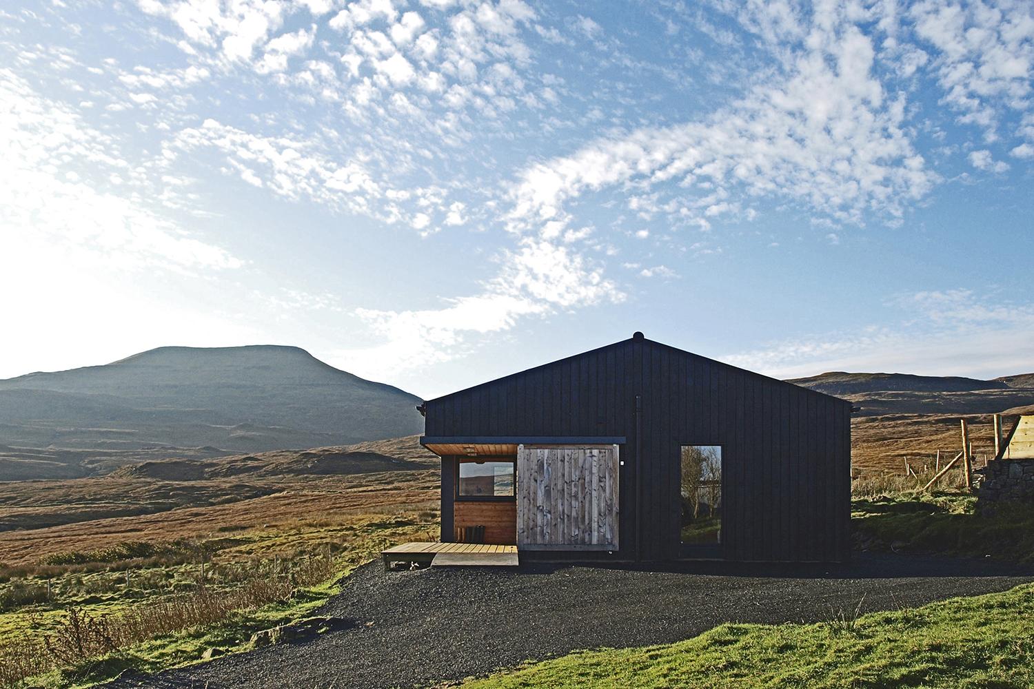 retreat from society and relax in these idyllic cabins around the world black shed 1